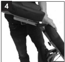 Person wearing a backpack and holding a bicycle (no visible text or symbols)
