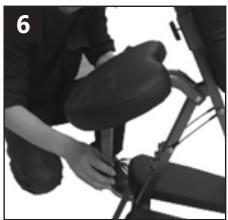 Close-up of a person adjusting a seatbelt on a bicycle (no visible text or symbols)