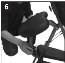 Close-up of a person's seatbelt being adjusted for bicycle wheel (no text or symbols visible)