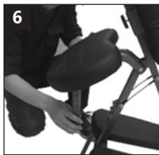 Person adjusting a bicycle seatbelt mechanism (no visible text or symbols)