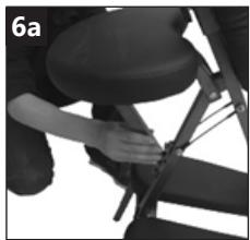 Close-up of a person seated on a chair holding a black seatbelt, no visible text or symbols