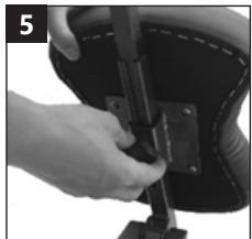 Close-up of a hand using a tool to adjust or install a black mechanical component (no visible text or symbols)