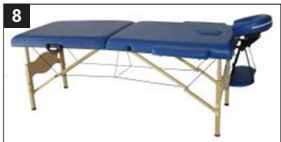 Blue medical examination table with adjustable armrest and backrest (no text or symbols visible)