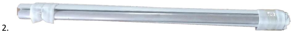 Transparent cylindrical object with white wrapped bands, no visible text or symbols