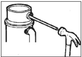 Simple line drawing of a hand holding a tool near a cylindrical object (no text or symbols)