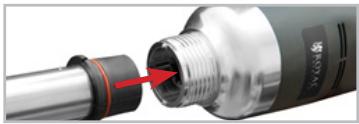 Close-up of a mechanical component with a red arrow pointing to a threaded end (no visible text or symbols)